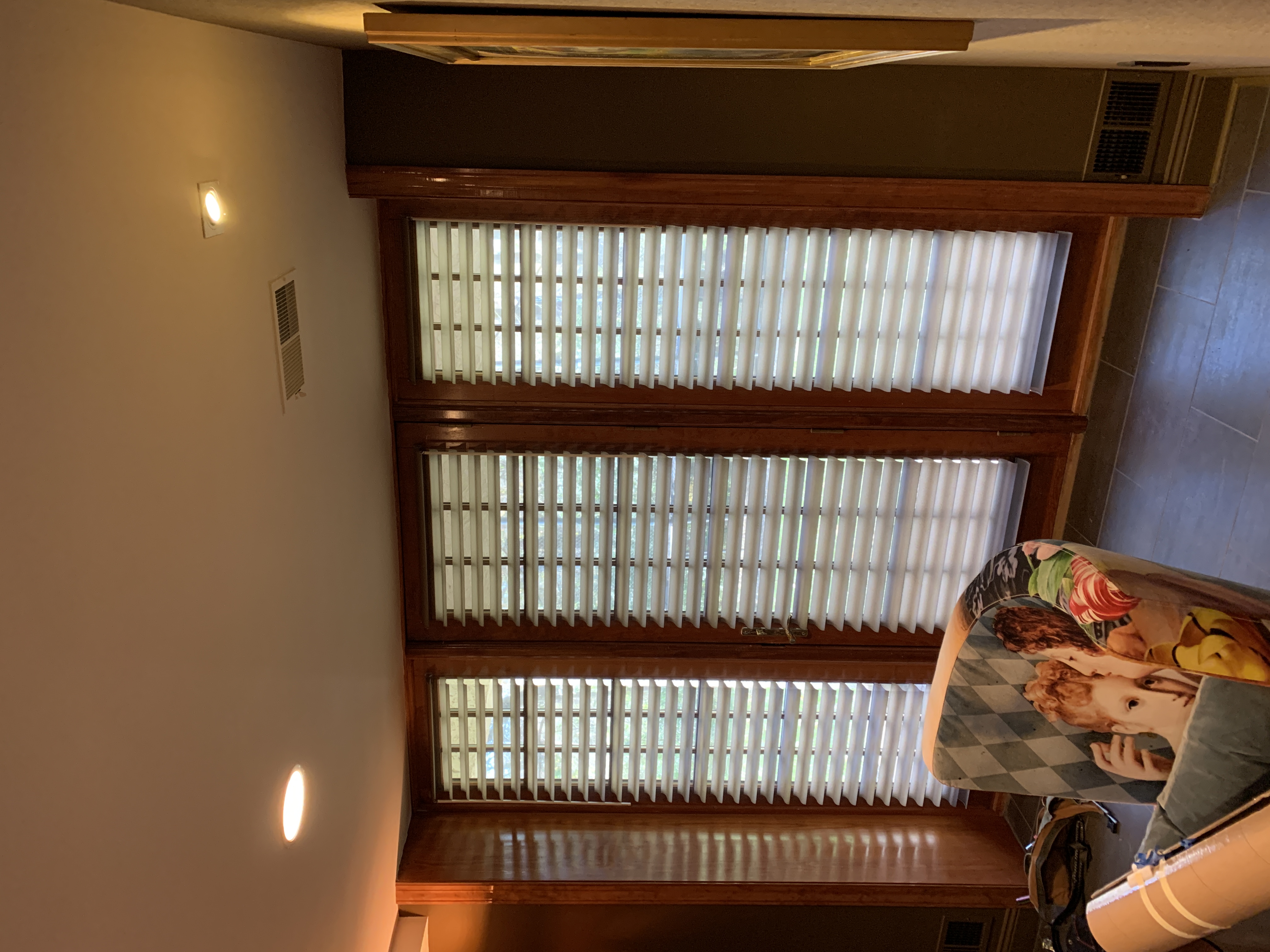 Norman PerfectSheer Shades installed on three windows