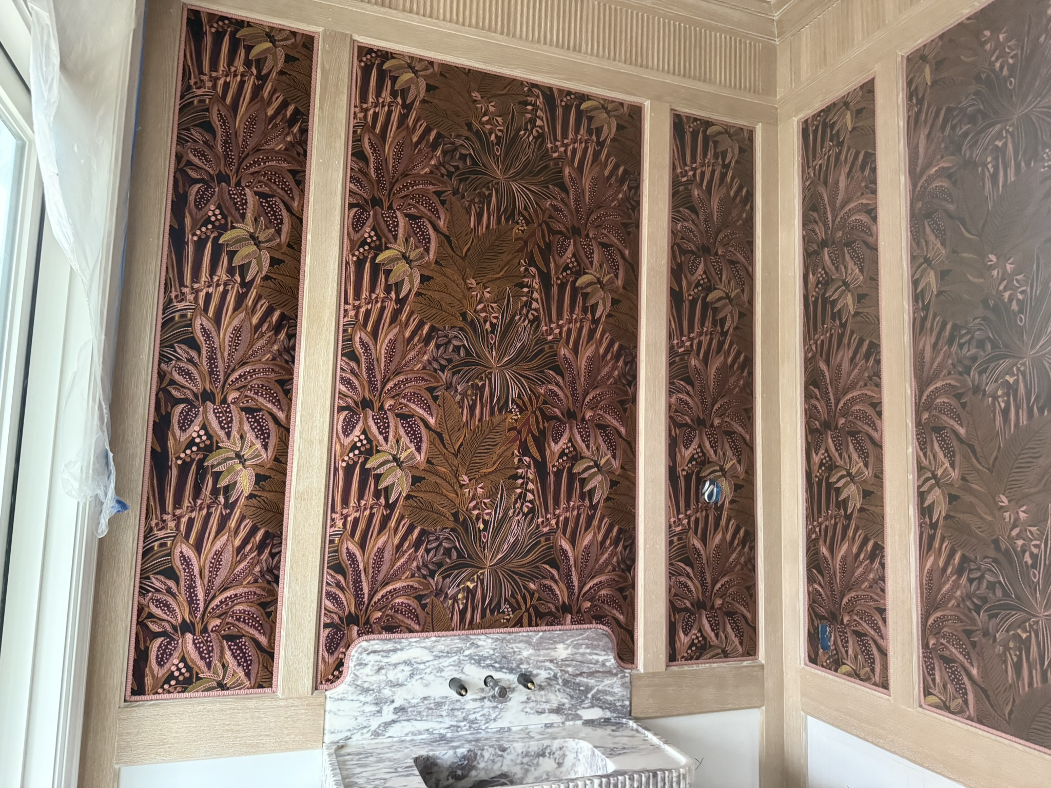 Acoustic wall upholstery — fabric panels with decorative botanical print